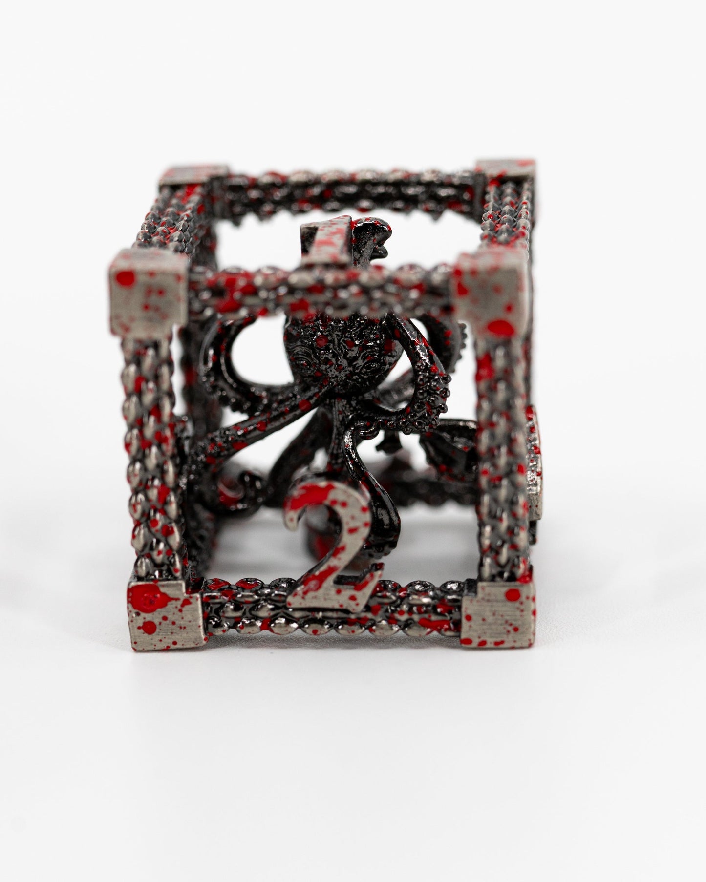 Scylla's Rage | Hollow Octopus Core | 7 Piece Hollow Metal Dice Set - Emberglow Gaming