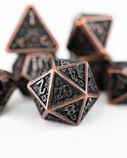 Ironmonger's Fist | 7 Piece Metal Dice Set - Emberglow Gaming