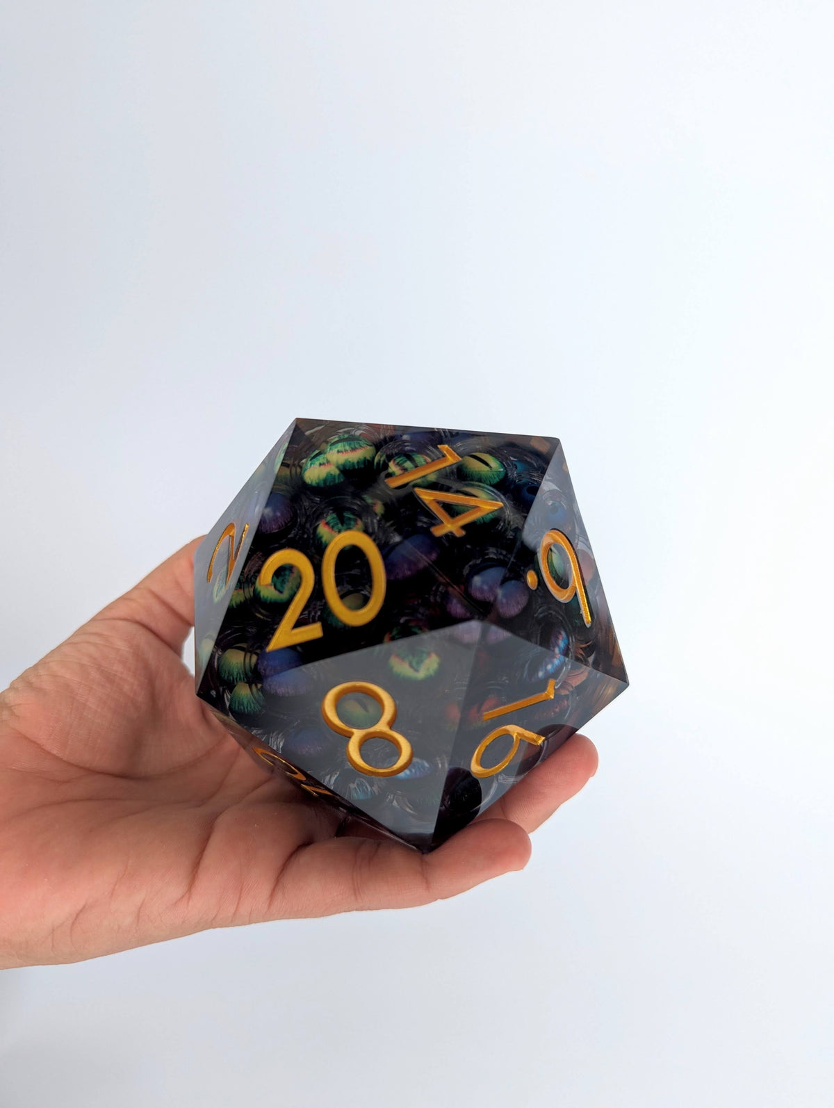 Beheld | Floating Multi Eye Inclusion | 85MM Sharp Edge D20 - Emberglow Gaming