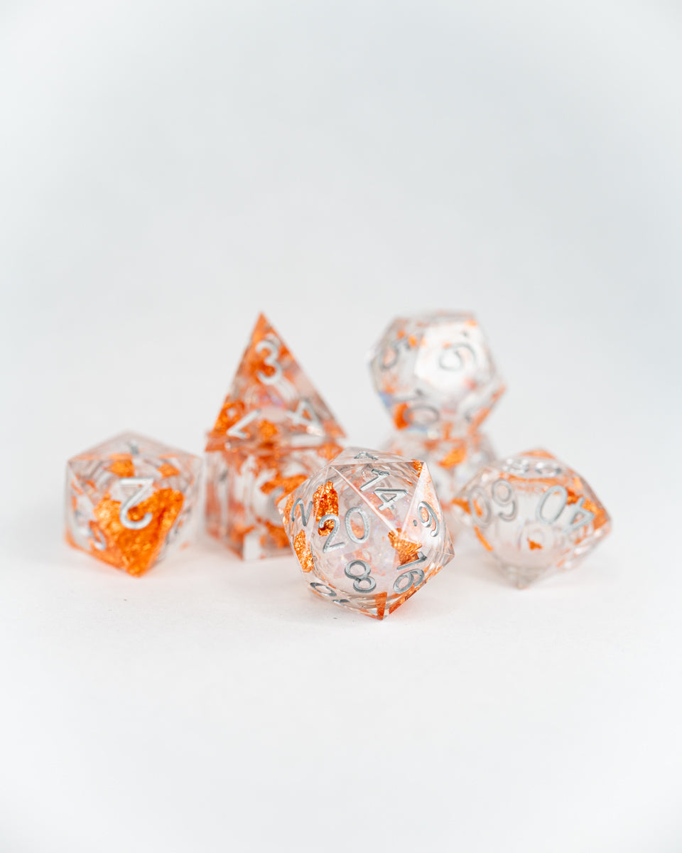 Alms for Angels | 7 Piece Liquid Core Dice Set - Emberglow Gaming